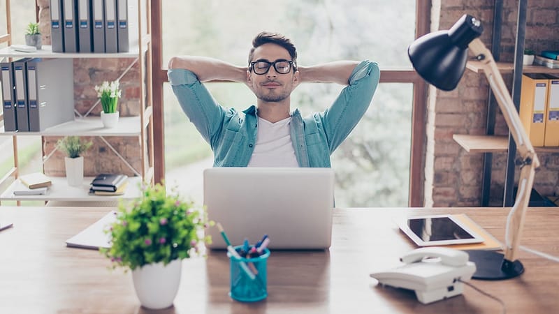 Mental Health - Man trying to find his zen working from home